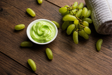Green grapes, yogurt and honey mix face mask or cream for skin dark spot removal treatment, created using Angoor extract, curd and honey. selective focus
