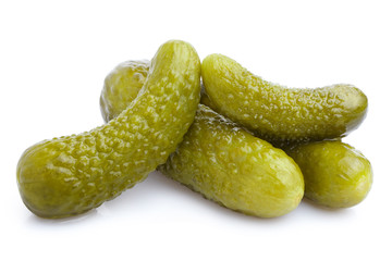Delicious marinated pickled cucumbers, isolated on white background