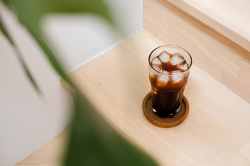 Ice Americano Coffee And ice Glass Wood Background