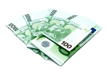 euro banknotes lie on a white background