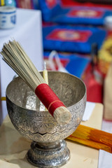 Wood and holy water bowl for making merit