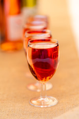 Glass of rosé in single file