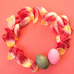 Easter wreath made of tulip petals and two Easter eggs