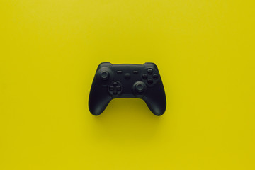 Stock photo of a gamepad on a green background