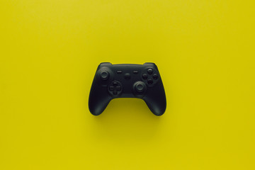 Stock photo of a gamepad on a green background © AdriaVidal