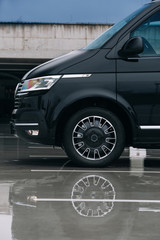 Modern luxury van on parking of modern business centre © UnPinky