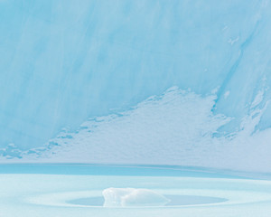Small ice formation in front of large ice berg, Greenland.
