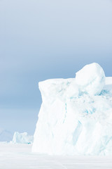 Fototapeta na wymiar Ice bergs on frozen sea, Greenland.