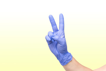 Fototapeta premium young woman with a medical mask on her face isolated on a white background. Rabbit.