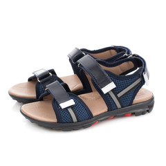 Dark blue with black sandals for boys isolated on white. Side view