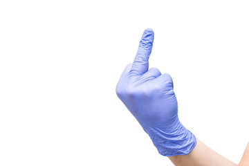 A hand with a blue latex glove shows an obscene gesture with the middle finger - fuck.