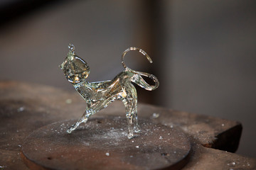 Algaida Es Pla, Majorca / Spain - August 25, 2016: A dog created at handmade glass manufacturing factory Guardiola, Algaida Es Pla, Mallorca, Balearic Islands, Spain.