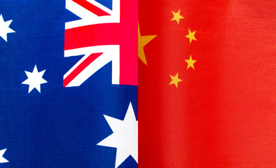 fragments of the national flags of Australia and the people's Republic of China close up