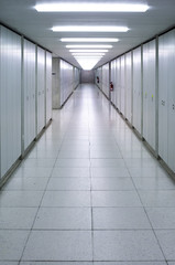 Illuminated empty corridor hallway bright neon lights