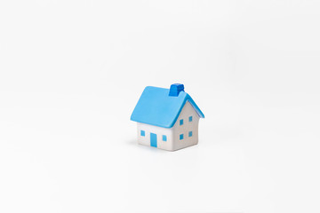 Fototapeta na wymiar house model over white background, Property investment and house mortgage financial concept