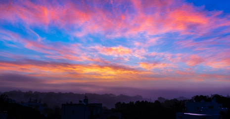 Morning of fog and sun. Dawn under a colorful sky. Mediterranean. Nice mornings