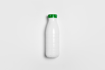 White glossy Plastic Bottle with screw cap for dairy products milk, drink yogurt, cream, dessert.Packaging Mockup template. High resolution photo.