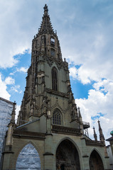 Fototapeta na wymiar Cathedral of Bern city Switzerland low angle view point overcast summer day