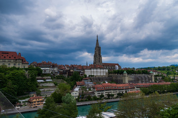 Obraz premium Bern city Switzerland view of the Cathedral overcast day dramatic clouds