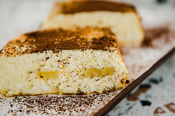 Cottage cheese baked cake, cheese cake pudding or casserole. Italian ricotta cheesecake. Delicious homemade cheesecake slice with berries 