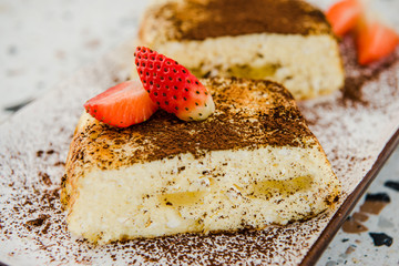 Cottage cheese baked cake, cheese cake pudding or casserole. Italian ricotta cheesecake. Delicious homemade cheesecake slice with berries 