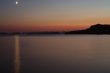Fototapeta na wymiar Beautiful lake view in Italy after sunset