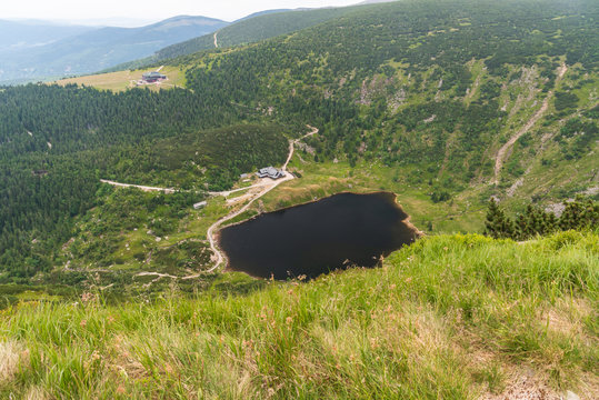 Maly Staw lake, Schronisko Samotnia and Strzecha Akademicka huts in Karkonosze mountains in Poland