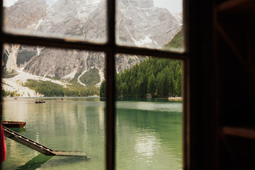 Beautiful view from the window on the lake Braies in the province of Bolzano, Trentino Alto Adige - Italy. 