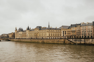Fototapeta na wymiar Conciergerie castle located on the west of the Ile de la Cite now used for law courts. Hundreds of prisoners during the French Revolution were taken from Conciergerie to be executed on the guillotine.