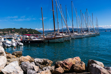 Fototapeta na wymiar La Spezia Italy riviera with docked sailing ships on a sunny summer day