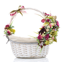 Fototapeta na wymiar Easter basket isolated on white background with floral decoration.