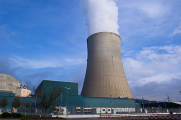 Outside wide angle shot of Gösgen Nuclear Power Plant in Switzerland on a nice autumn day with...