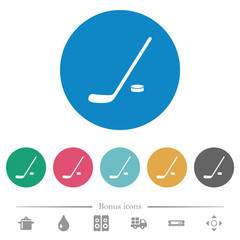 Hockey stick and puck flat round icons
