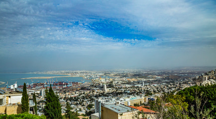 Panoramic view of the harbor port of Haifa, with downtown Haifa, the harbor, the industrial zone in a sunny summer day. Haifa, Northern Israel