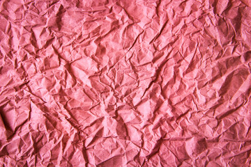 Pink abstract background, crumpled antique paper texture.
