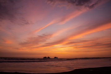 Fototapeta na wymiar sunset on Three island beach lima peru