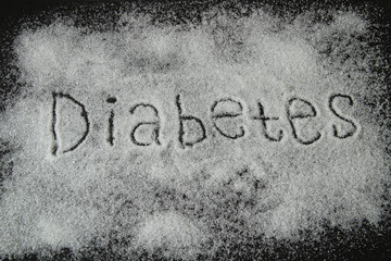 diabetes, sugar, the text is written on a black background with sugar