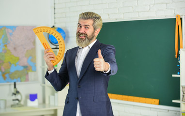 Modern teaching method. Just in theory. Communicative skills. Good luck. Modern teacher lesson. Study and education. Modern school. Knowledge day. Handsome bearded man in classroom chalkboard