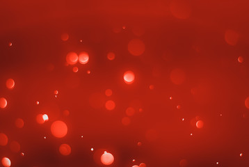 Ruby red bokeh background with soft blur bokeh light effect, background bokeh