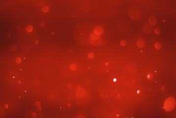 Ruby red bokeh background with soft blur bokeh light effect, background bokeh