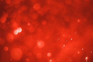 Ruby red bokeh background with soft blur bokeh light effect, background bokeh