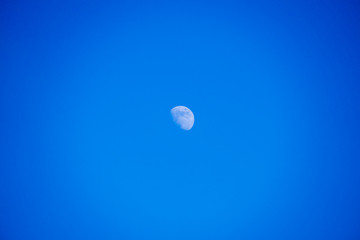 The moon in a blue ski