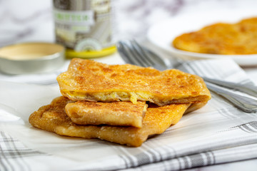 Pan fried whole wheat paratha, stuffed with sliced banana and cheese, crispy on the outside and soft on the inside