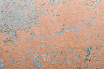 Old painted wall with cracked paint