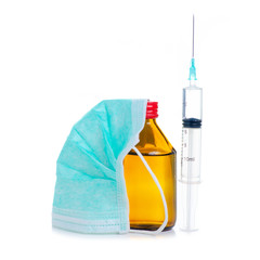 glass medicine bottle with syringe injection, medical mask on white background isolation