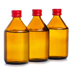 Medicine bottle of brown glass alcohol on white background isolation