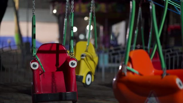Empty amusement park at night.