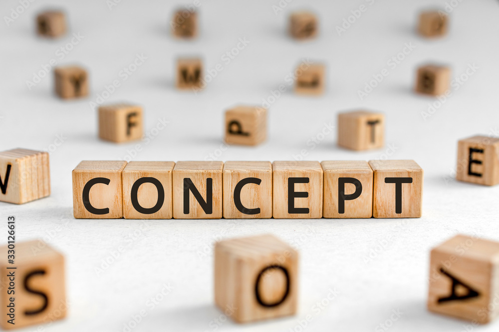 Poster concept - word from wooden blocks with letters, an abstract idea concept, random letters around whit