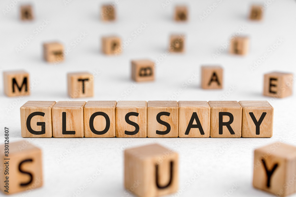 Poster glossary - word from wooden blocks with letters, alphabetical list of terms glossary concept, random