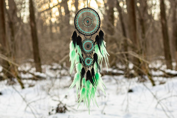 Naklejka premium Handmade dream catcher with feathers threads and beads rope hanging